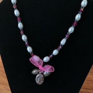 Beaded necklace with heart and portrait charms